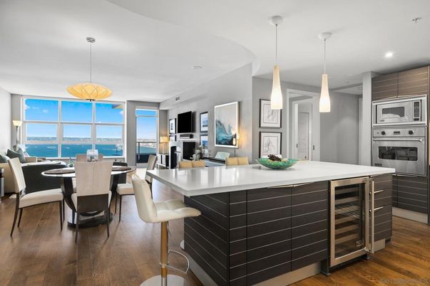 Dining room, Interior, Kitchen, Pendant Lights, Recessed Lighting, Stainless Steel Appliances, Water, Wood Texture Flooring