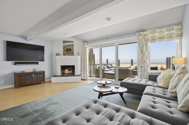 Fireplace, Interior, Living room, Recessed Lighting, Water, Wood Texture Flooring