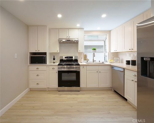 Interior, Kitchen, Recessed Lighting, Stainless Steel Appliances, Wood Texture Flooring