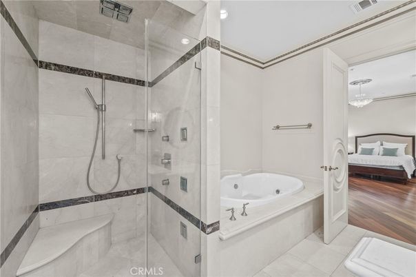 Bathroom, Bedroom, Chandelier, Glass Shower, Interior, Recessed Lighting, Wood Texture Flooring