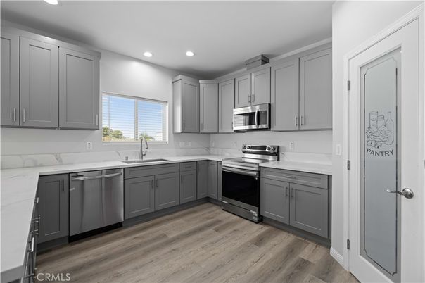 Interior, Kitchen, Recessed Lighting, Stainless Steel Appliances, Wood Texture Flooring
