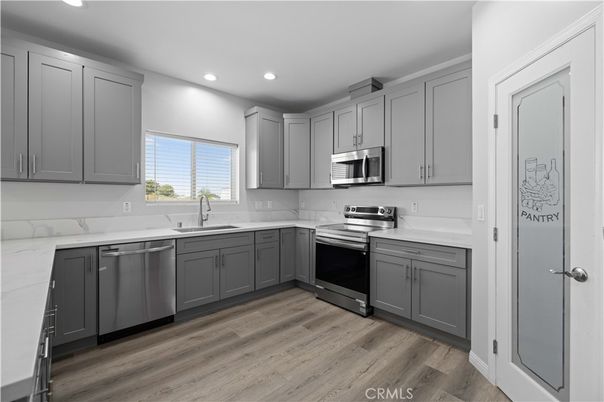 Interior, Kitchen, Recessed Lighting, Stainless Steel Appliances, Wood Texture Flooring