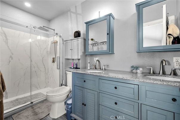 Bathroom, Glass Shower, Interior, Marble Walls, Recessed Lighting, Wood Texture Flooring