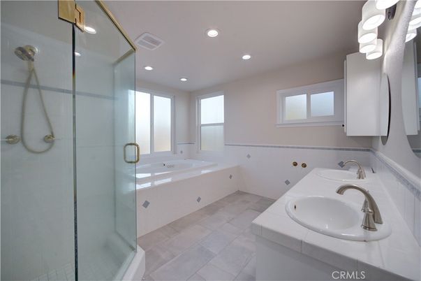 Bathroom, Dual Sink Vanities, Glass Shower, Interior, Recessed Lighting, Tile Countertops