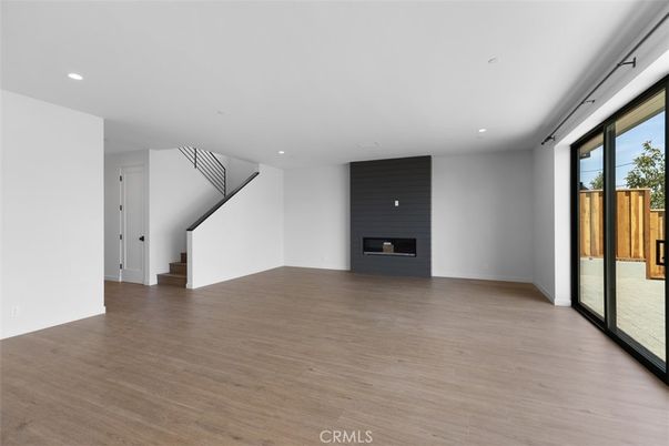 Empty room, Fireplace, Interior, Recessed Lighting, Wood Texture Flooring