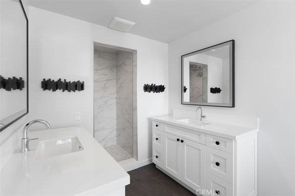 Bathroom, Dual Sink Vanities, Interior, Marble Walls, Recessed Lighting