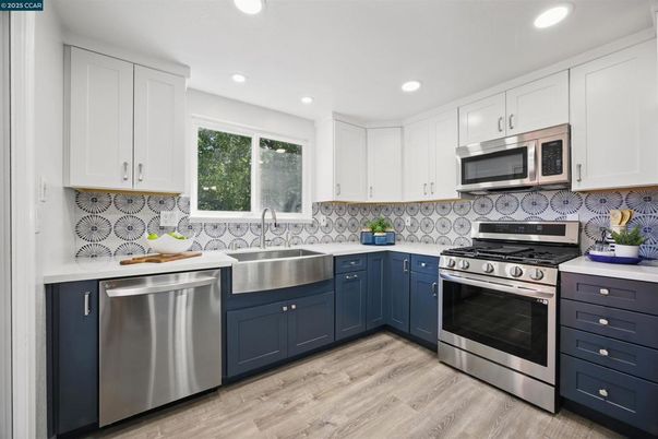 Interior, Kitchen, Recessed Lighting, Stainless Steel Appliances, Wood Texture Flooring