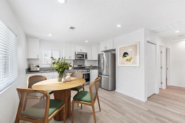 Dining room, Interior, Kitchen, Recessed Lighting, Stainless Steel Appliances, Wood Texture Flooring