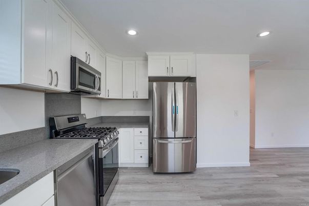 Interior, Kitchen, Recessed Lighting, Stainless Steel Appliances, Wood Texture Flooring