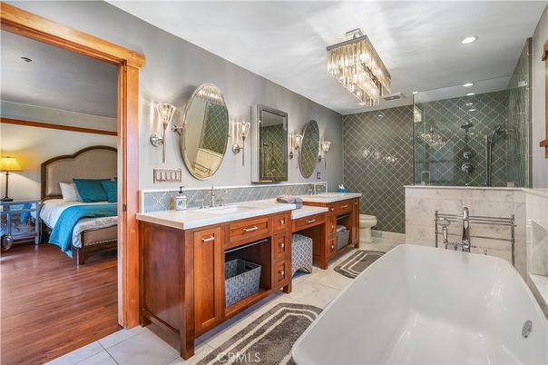 Bathroom, Bedroom, Chandelier, Dual Sink Vanities, Free Standing Baths, Glass Shower, Interior, Recessed Lighting, Wood Texture Flooring