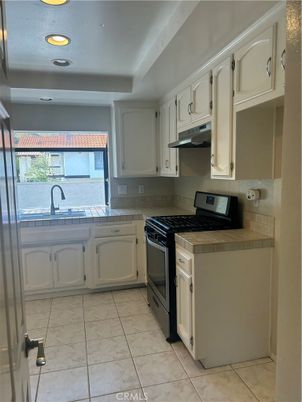 Interior, Kitchen, Recessed Lighting, Tile Countertops