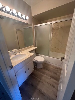 Bathroom, Dual Sink Vanities, Glass Shower, Interior, Wood Texture Flooring