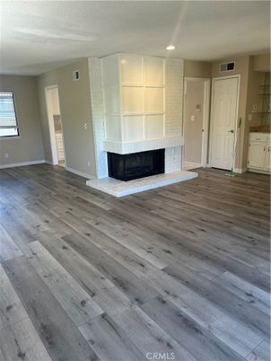 Empty room, Fireplace, Interior, Recessed Lighting, Wood Texture Flooring