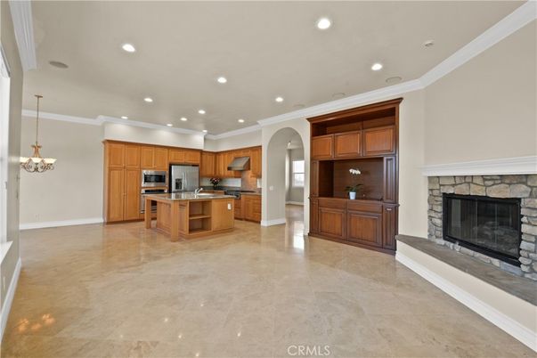 Chandelier, Fireplace, Interior, Kitchen, Recessed Lighting, Stainless Steel Appliances