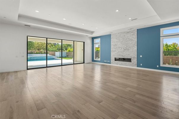 Empty room, Fireplace, Interior, Recessed Lighting, Wood Texture Flooring
