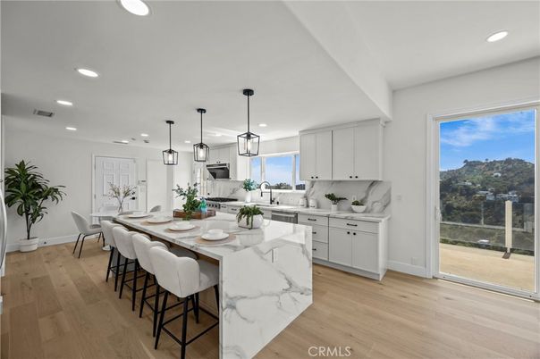 Dining room, Interior, Kitchen, Pendant Lights, Recessed Lighting, Stainless Steel Appliances, Wood Texture Flooring