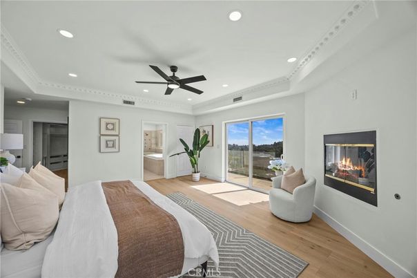 Bedroom, Fireplace, Interior, Recessed Lighting, Wood Texture Flooring
