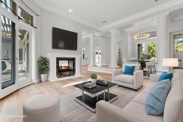 Chandelier, Dining room, Fireplace, Interior, Living room, Pendant Lights, Recessed Lighting, Wood Texture Flooring
