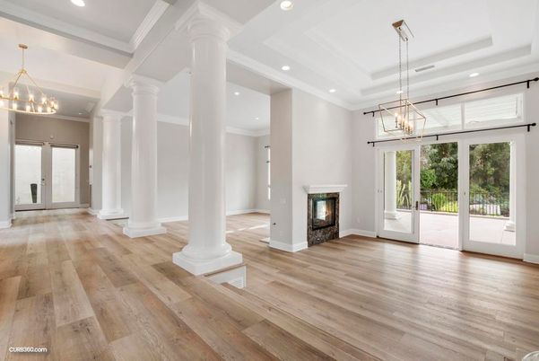 Chandelier, Empty room, Fireplace, Interior, Pendant Lights, Recessed Lighting, Wood Texture Flooring