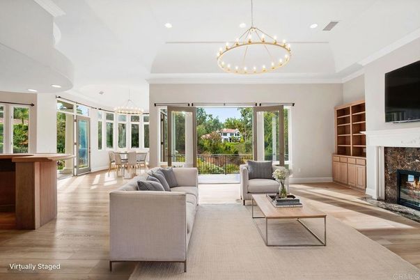 Chandelier, Dining room, Fireplace, Interior, Living room, Pendant Lights, Recessed Lighting, Wood Texture Flooring