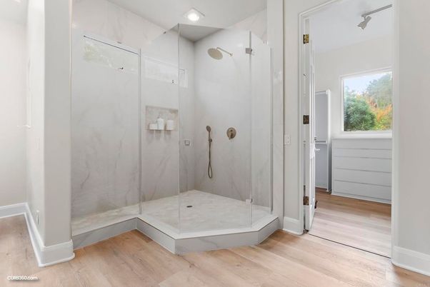 Bathroom, Glass Shower, Interior, Marble Walls, Recessed Lighting, Wood Texture Flooring