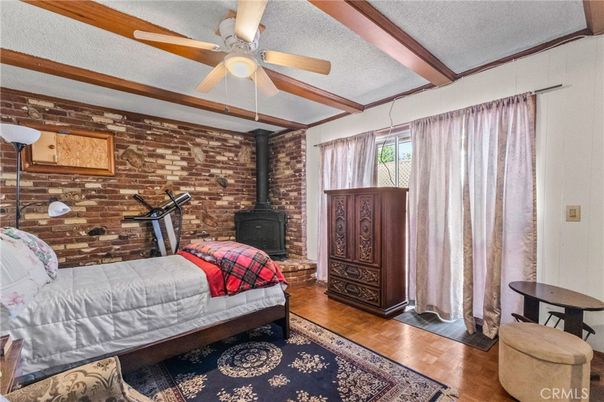 Bedroom, Fireplace, Interior, Stone Walls, Wood Texture Flooring