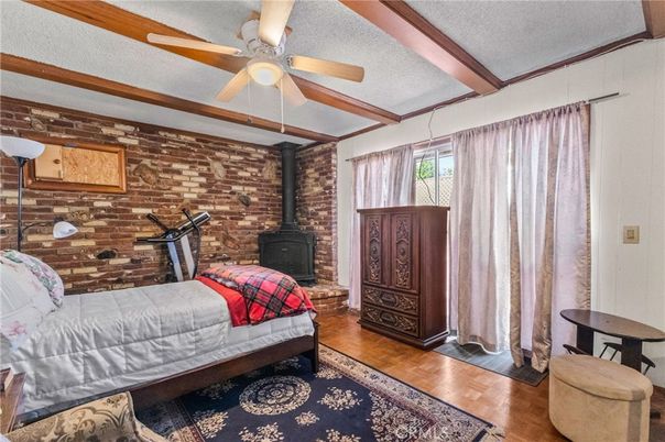 Bedroom, Fireplace, Interior, Stone Walls, Wood Texture Flooring