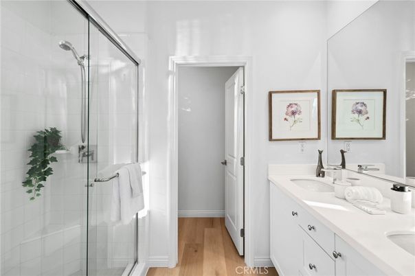 Bathroom, Dual Sink Vanities, Glass Shower, Interior, Wood Texture Flooring