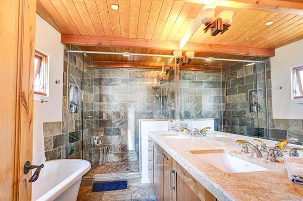 Bathroom, Dual Sink Vanities, Free Standing Baths, Glass Shower, Interior, Recessed Lighting, Stone Walls, Wooden Beams, Wooden Ceilings