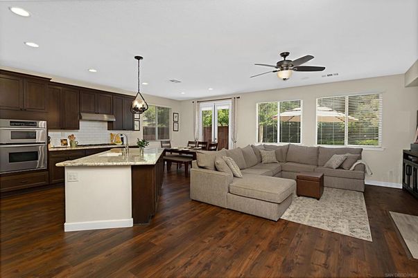 Dining room, Interior, Kitchen, Living room, Pendant Lights, Recessed Lighting, Stainless Steel Appliances, Wood Texture Flooring