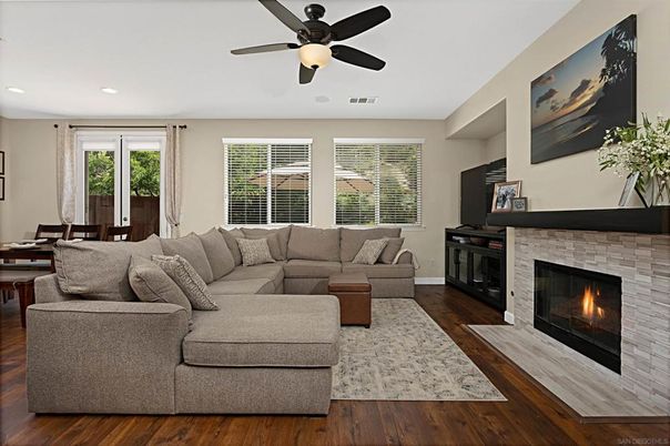 Dining room, Fireplace, Interior, Living room, Recessed Lighting, Wood Texture Flooring