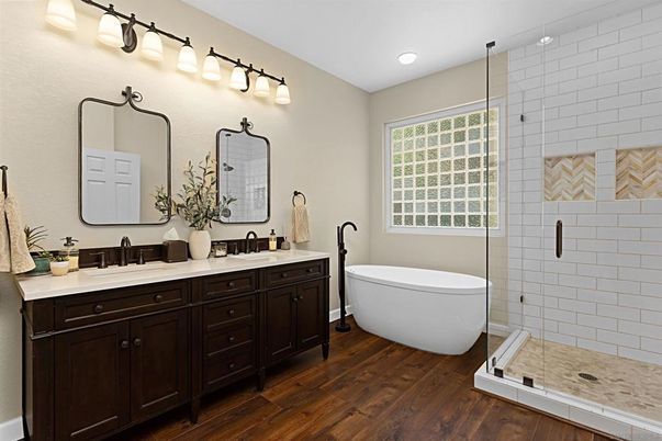 Bathroom, Dual Sink Vanities, Free Standing Baths, Glass Shower, Interior, Recessed Lighting, Wood Texture Flooring