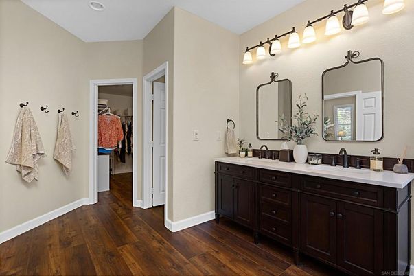 Bathroom, Dual Sink Vanities, Interior, Recessed Lighting, Wood Texture Flooring