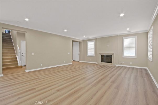 Empty room, Fireplace, Interior, Recessed Lighting, Wood Texture Flooring
