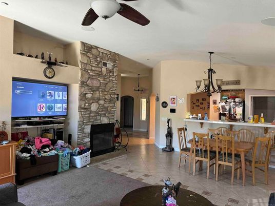 Chandelier, Dining room, Fireplace, Interior, Pendant Lights, Stone Walls