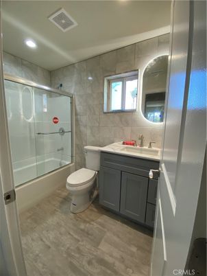 Bathroom, Glass Shower, Interior, Recessed Lighting, Wood Texture Flooring