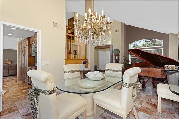 Chandelier, Dining room, Interior, Piano, Recessed Lighting