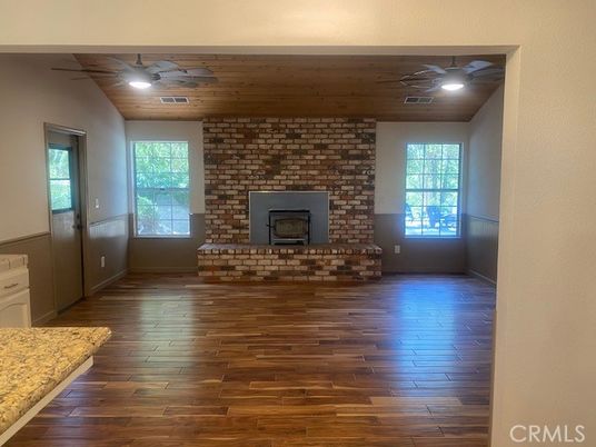 Empty room, Fireplace, Interior, Stone Walls, Wood Texture Flooring