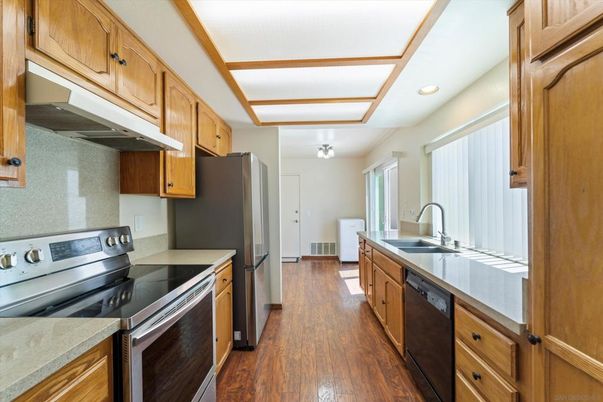 Interior, Kitchen, Recessed Lighting, Stainless Steel Appliances, Wood Texture Flooring