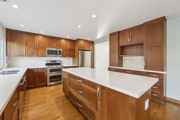 Interior, Kitchen, Recessed Lighting, Stainless Steel Appliances, Wood Texture Flooring