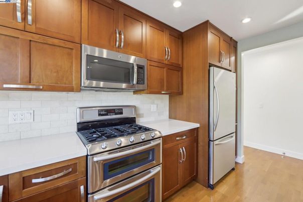 Interior, Kitchen, Recessed Lighting, Stainless Steel Appliances, Wood Texture Flooring