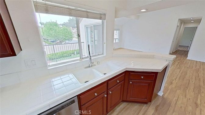 Interior, Kitchen, Recessed Lighting, Tile Countertops, Wood Texture Flooring