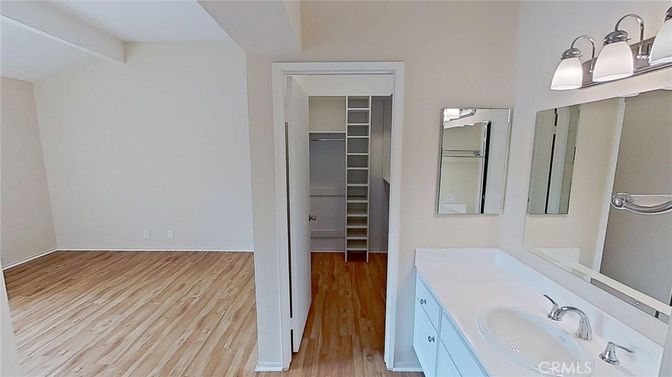 Bathroom, Dual Sink Vanities, Interior, Walk-in Closets, Wood Texture Flooring