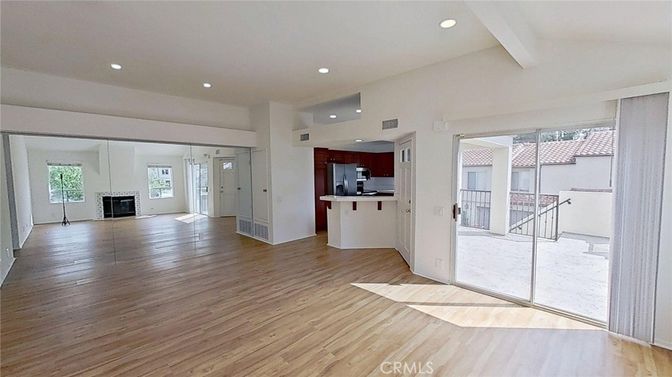 Empty room, Fireplace, Interior, Kitchen, Recessed Lighting, Wood Texture Flooring