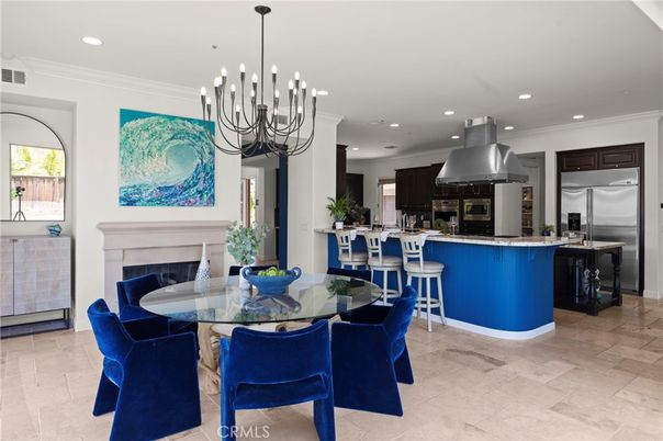 Chandelier, Dining room, Fireplace, Interior, Kitchen, Pendant Lights, Recessed Lighting, Stainless Steel Appliances