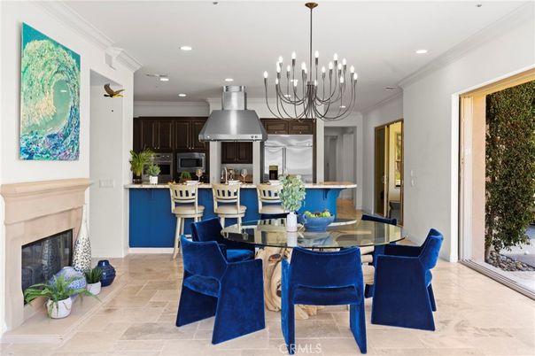 Chandelier, Dining room, Fireplace, Interior, Kitchen, Pendant Lights, Recessed Lighting, Stainless Steel Appliances