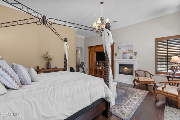 Bedroom, Chandelier, Fireplace, Interior, Pendant Lights, Wood Texture Flooring