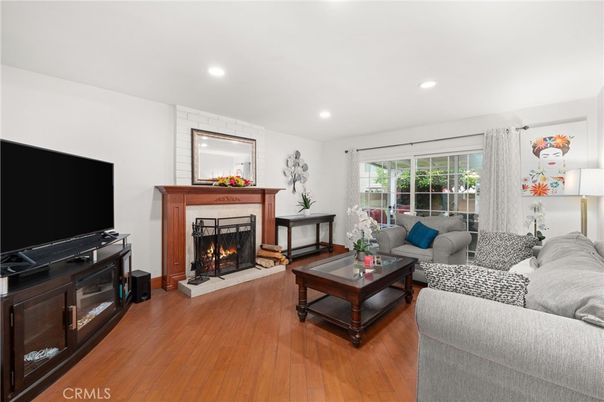 Fireplace, Interior, Living room, Recessed Lighting, Wood Texture Flooring