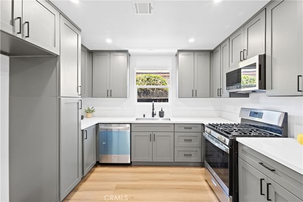Interior, Kitchen, Recessed Lighting, Stainless Steel Appliances, Wood Texture Flooring