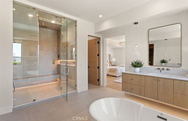 Bathroom, Bedroom, Dual Sink Vanities, Free Standing Baths, Glass Shower, Interior, Pendant Lights, Recessed Lighting